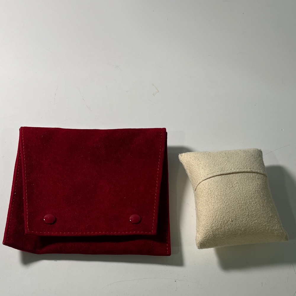Cartier Red and Cream Suede Pouch

  In pristine condition!